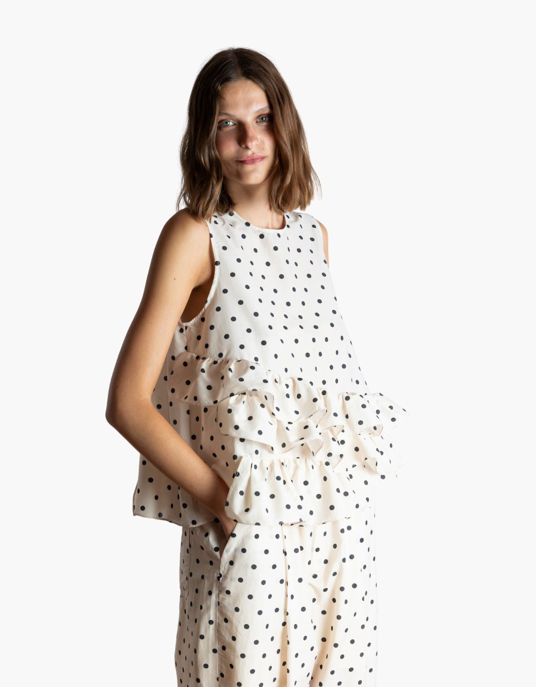 Haut à pois noirs et blancs