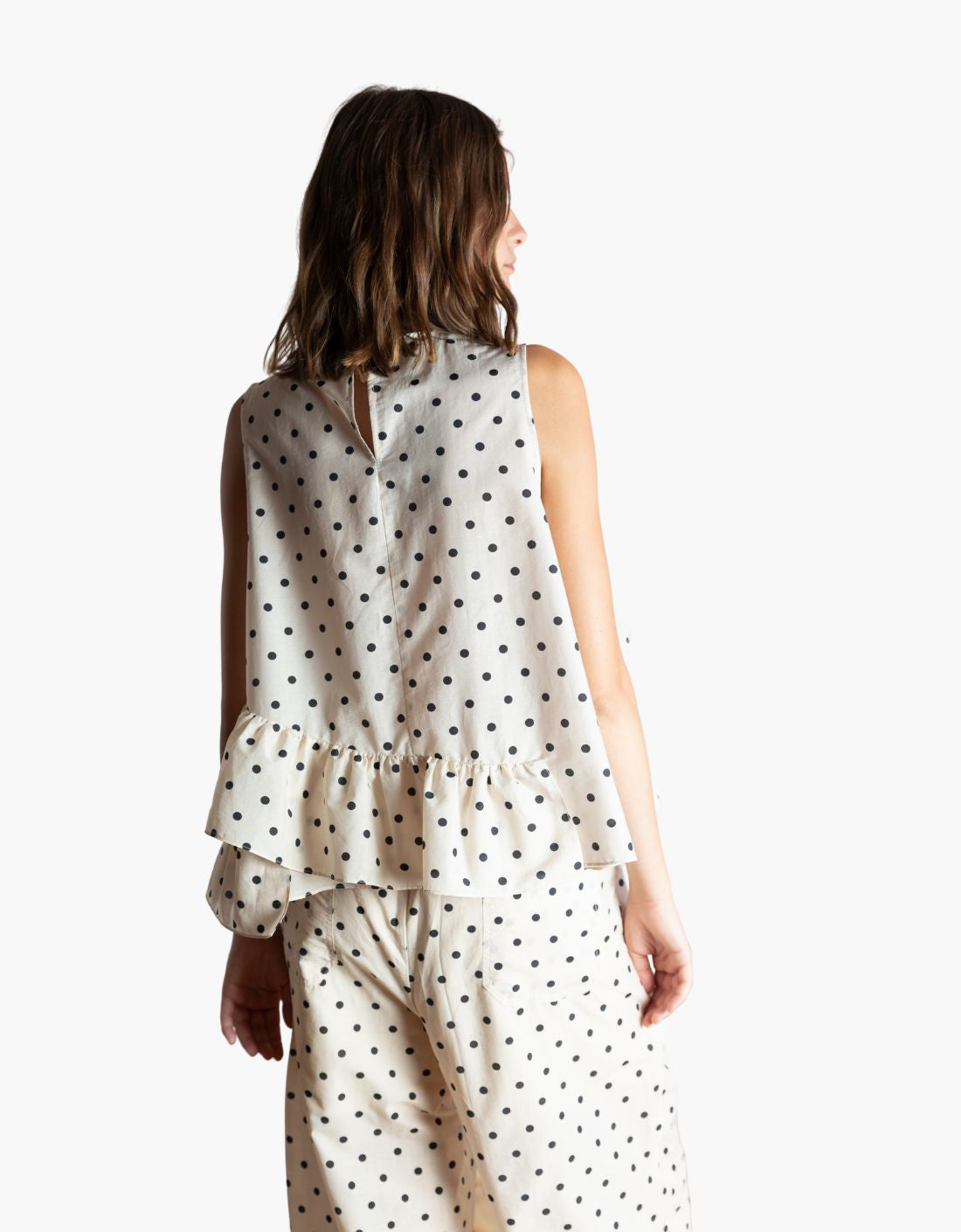 Haut à pois noirs et blancs