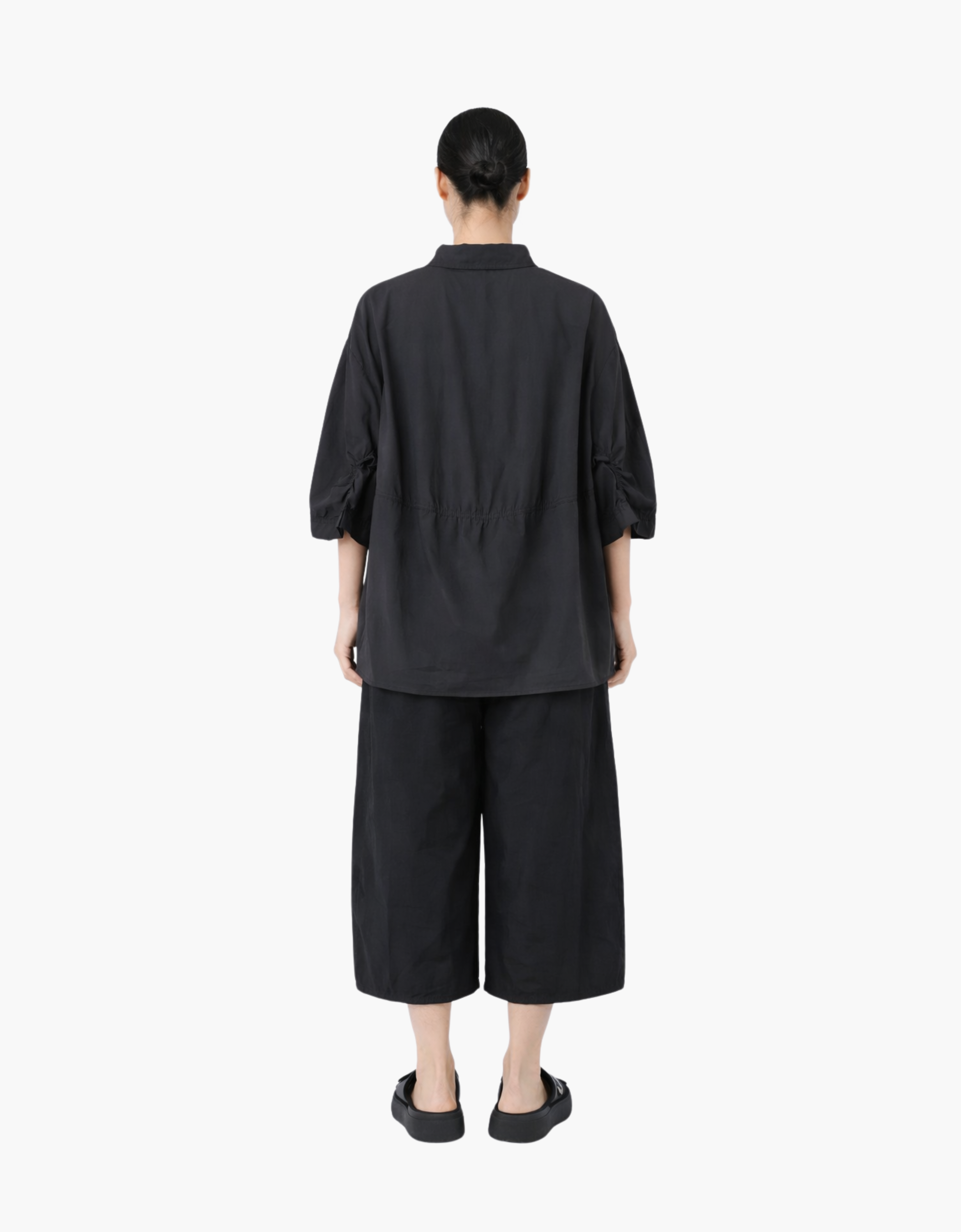 Camisa oversize media manga