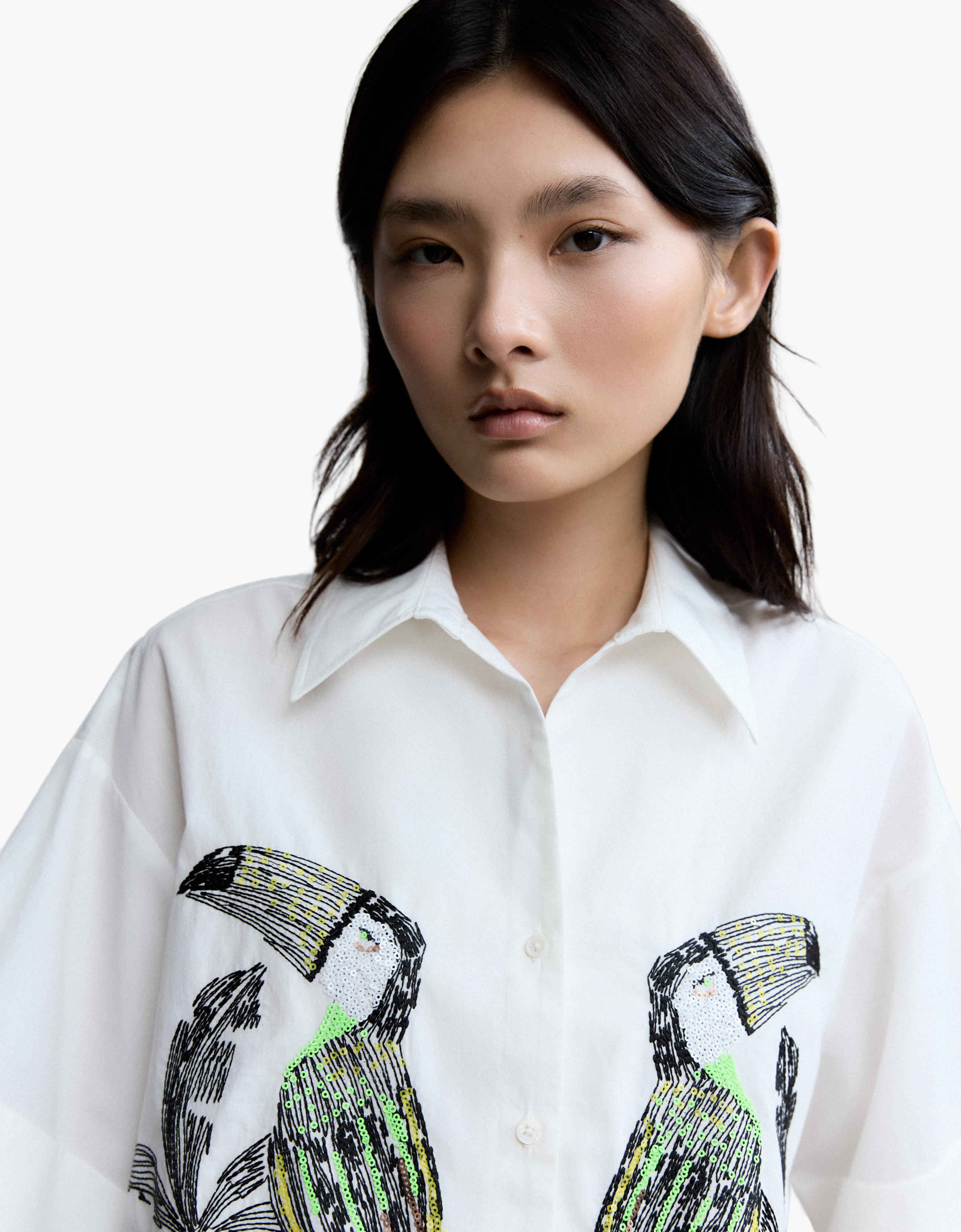 Camisa tucanes lentejuelas