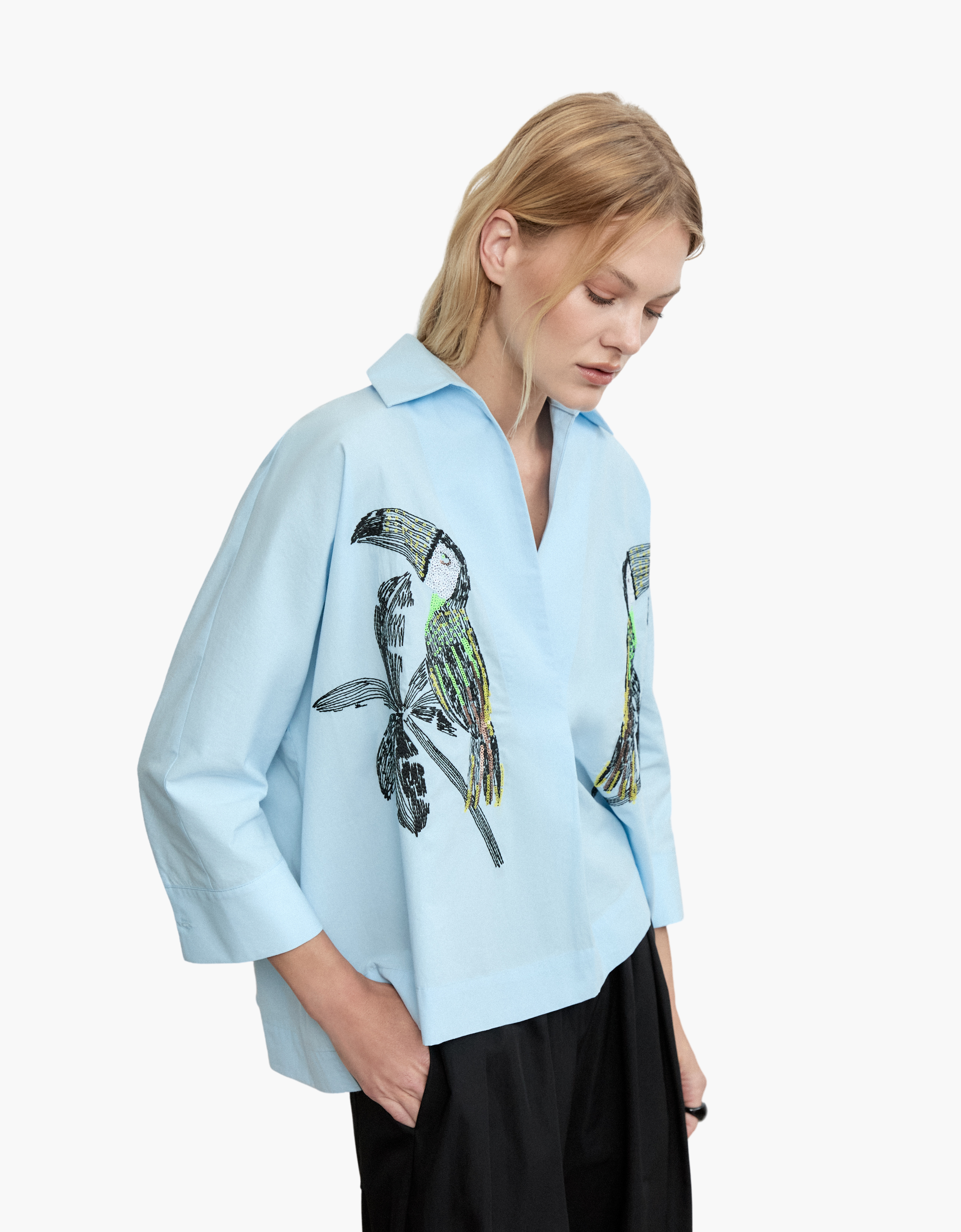 Blusa tucanes lentejuelas