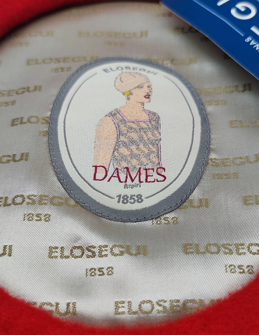 Boina para mujer ELOSEGUI en lana con diseño clásico y color neutro, vista frontal de la prenda sobre fondo blanco.
