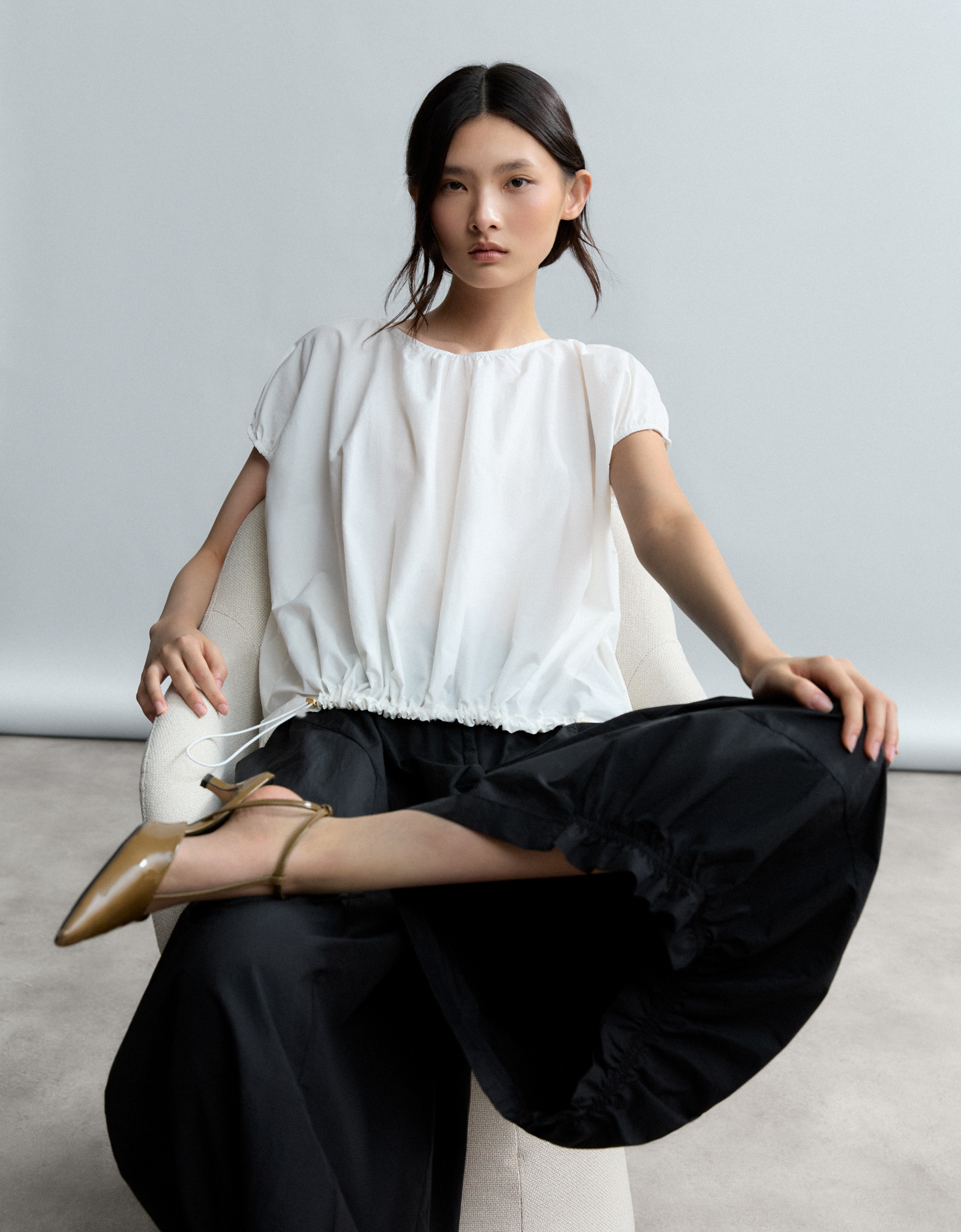 Camisa goma ajustable